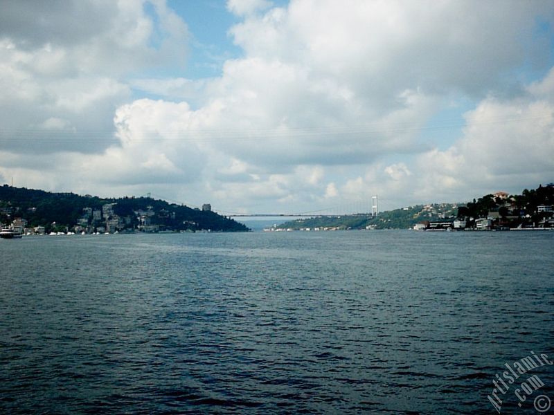 View towards Fatih Sultan Mehmet Bridge over the Bosphorus from between Arnavutkoy shore and Vanikoy shore in the middle of the Bosphorus in Istanbul city of Turkey.
