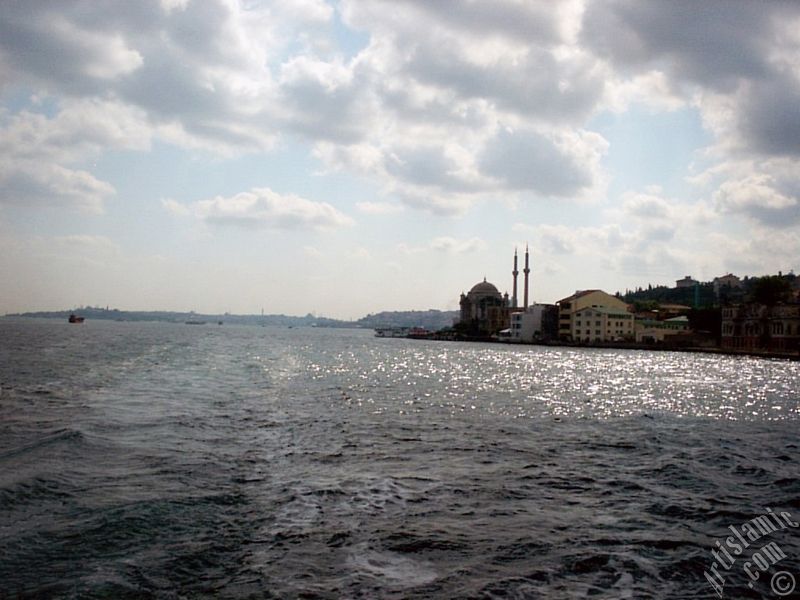 View of Ortakoy coast and Ortakoy Mosque from the Bosphorus in Istanbul city of Turkey.
