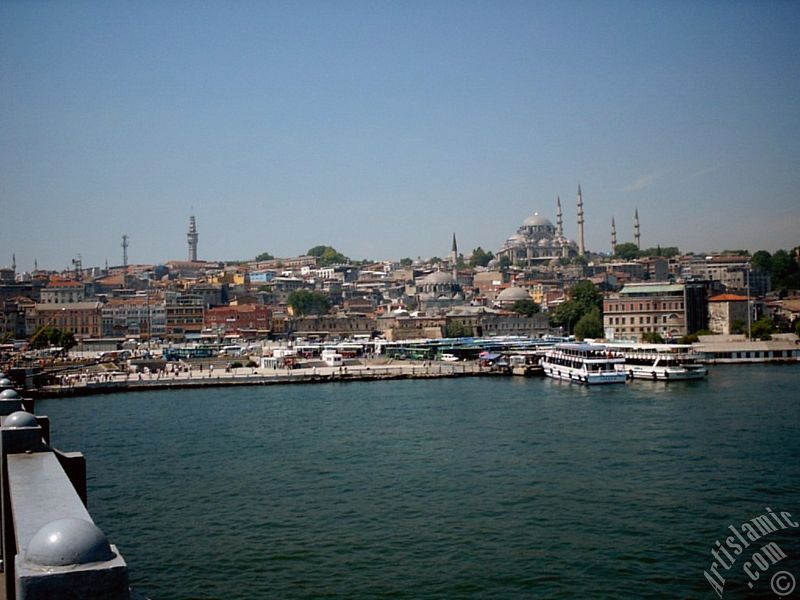 View of coast, (from left) Beyazit Tower, below Rustem Pasha Mosque and above it Suleymaniye Mosque from Galata Bridge located in Istanbul city of Turkey.
